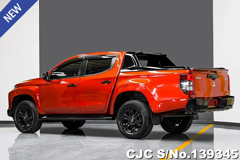 Mitsubishi Triton in Orange for Sale Image 1